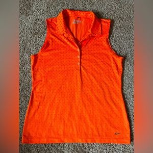 Two Nike women’s Dri Fit golf polos, size large